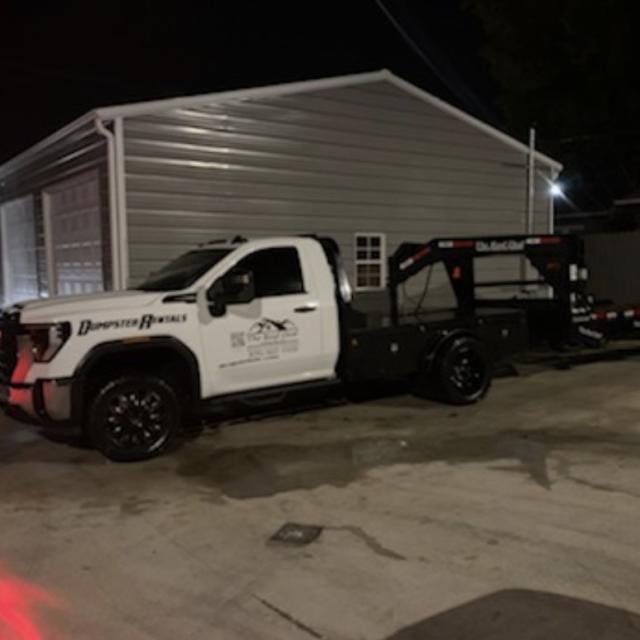 Dumpster Delivery Truck
