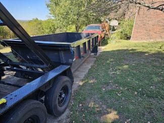 Delivering a roll-off dumpster