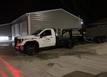 Dumpster Delivery Truck